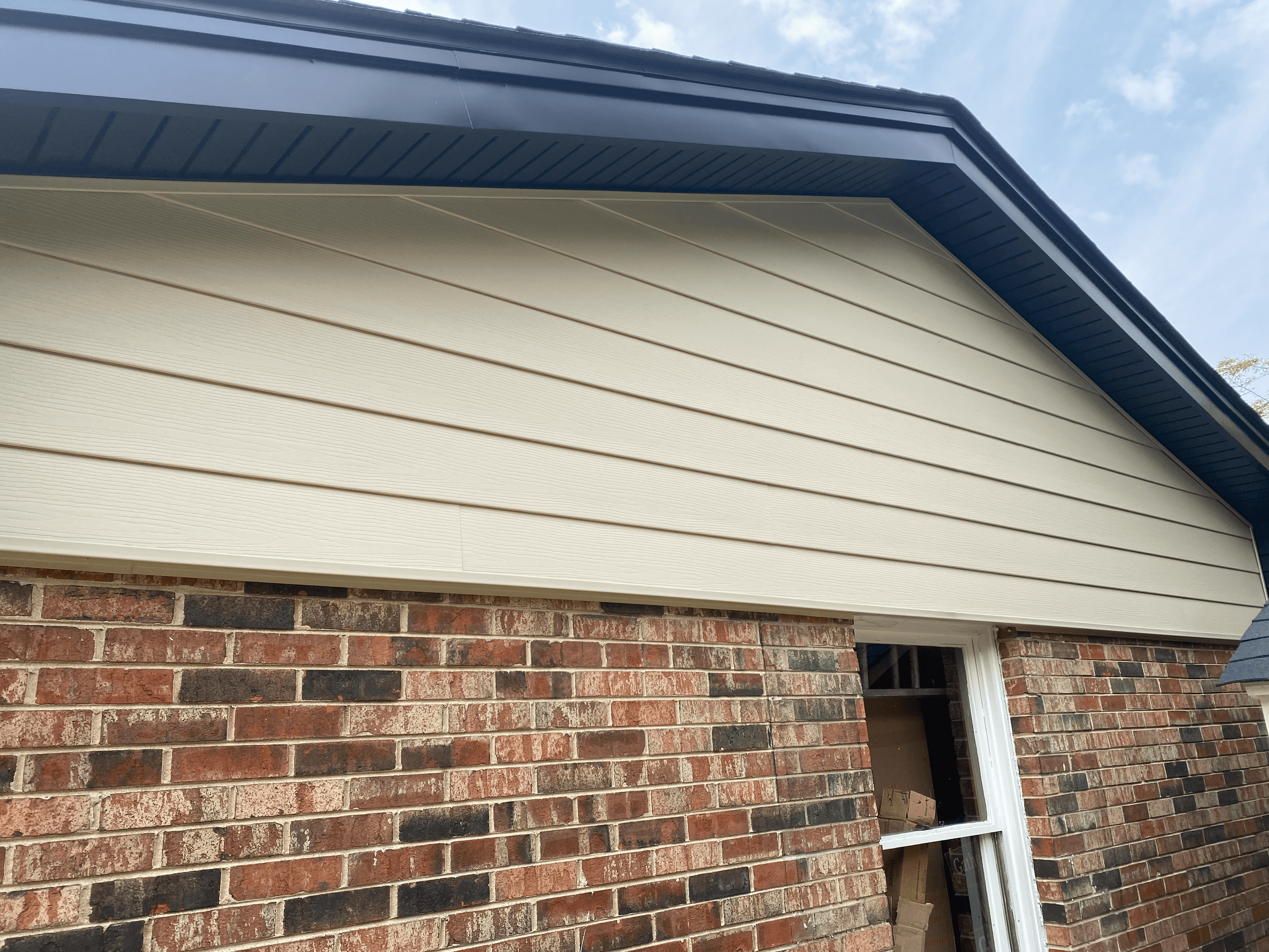 Ascend Siding in Monterey Sand - Black Soffit Fascia and Gutters - Lincolnshire IL (2)